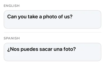 Phrase panel with the English phrase and its Spanish translation “¿Nos puedes sacar una foto?”